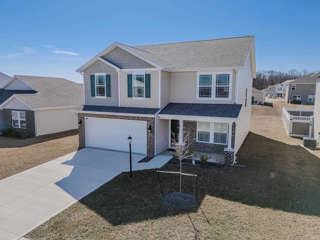 view of front of house with central AC unit, fence, driveway, roof with shingles, and an attached garage