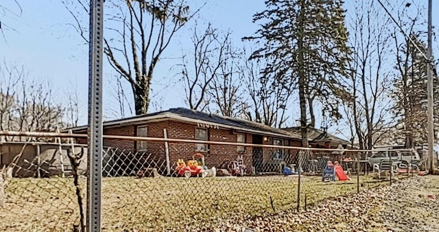 exterior space featuring brick siding