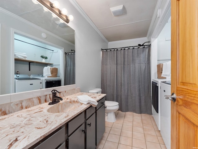 full bathroom featuring vanity, washing machine and clothes dryer, ornamental molding, tile patterned flooring, and toilet