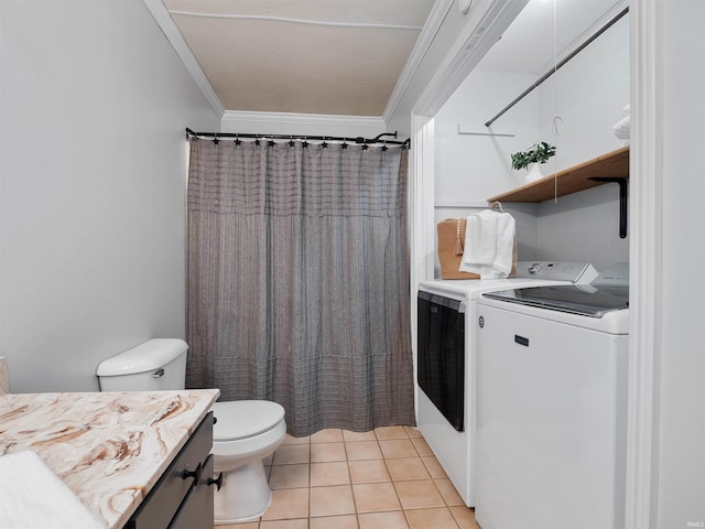 full bathroom featuring vanity, washer and dryer, crown molding, toilet, and tile patterned floors