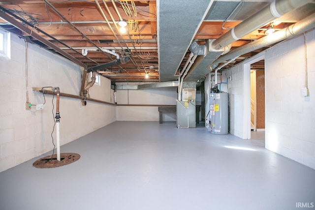 unfinished basement with heating unit and water heater