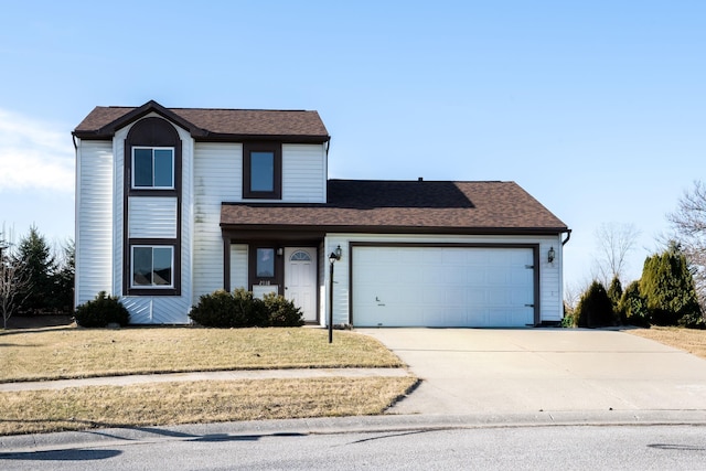 traditional-style home with a front lawn, concrete driveway, an attached garage, and a shingled roof