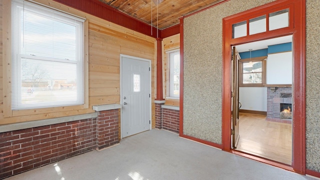 entrance foyer featuring a fireplace