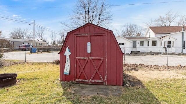 view of shed with fence private yard