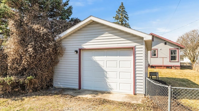 garage with fence