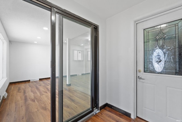 doorway to property with visible vents