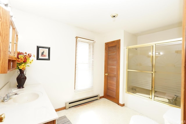 bathroom featuring a wealth of natural light, toilet, baseboard heating, and shower / bath combination with glass door