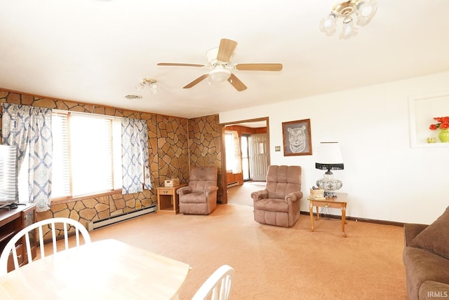 carpeted living room featuring ceiling fan, baseboards, visible vents, and a baseboard radiator