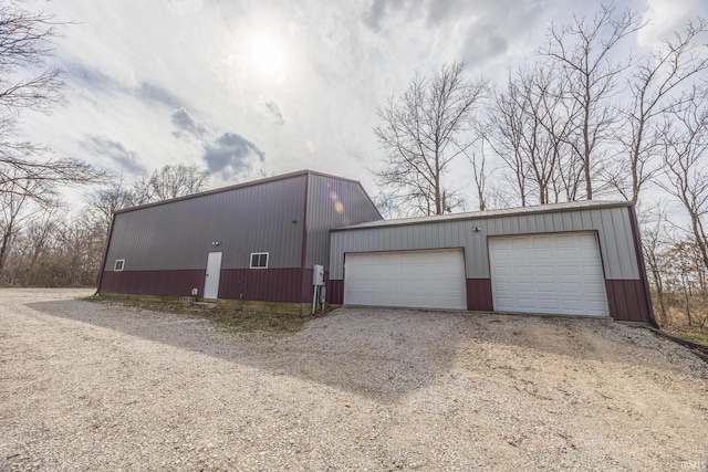 exterior space with dirt driveway