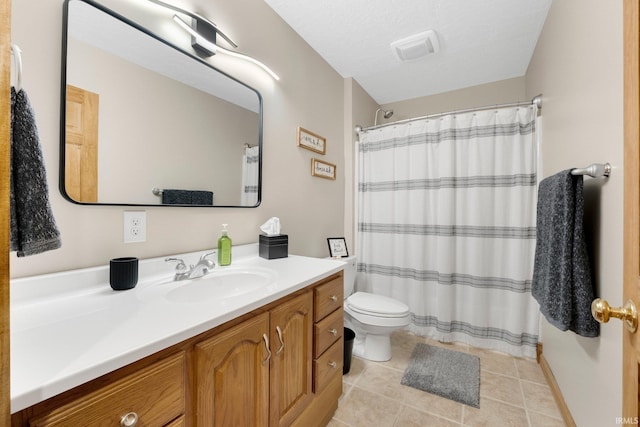 full bath featuring vanity, a shower with curtain, visible vents, tile patterned flooring, and toilet