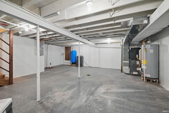 unfinished basement featuring stairs, gas water heater, concrete block wall, and heating unit