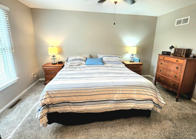 bedroom with visible vents, baseboards, and carpet flooring