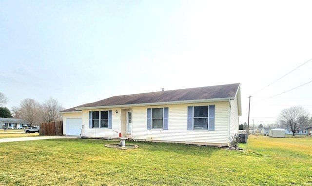 single story home with concrete driveway, a garage, cooling unit, and a front yard