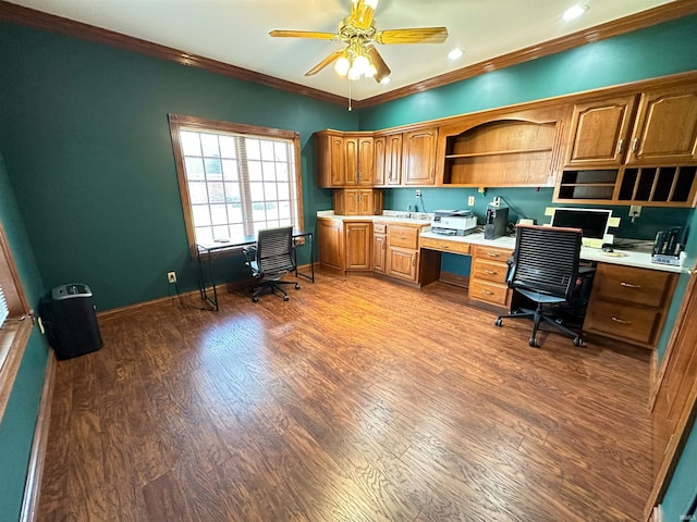 office with wood finished floors, built in study area, a ceiling fan, and ornamental molding