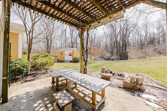 view of patio featuring an outbuilding, a storage unit, and a pergola