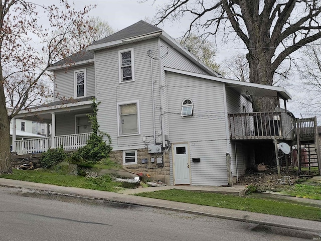 view of home's exterior featuring covered porch