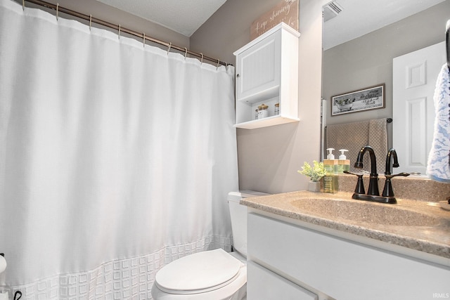 full bath featuring visible vents, toilet, and vanity