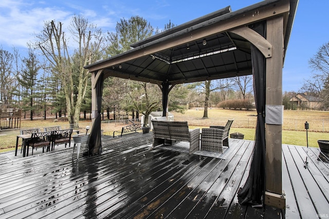 wooden deck with a gazebo