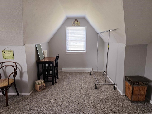 interior space featuring vaulted ceiling, carpet, baseboards, and baseboard heating