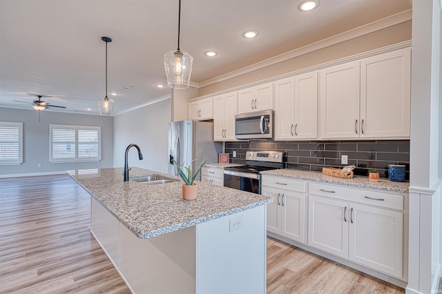 19138 Braeburn Dr, Evansville, IN 47725 - kitchen featuring a sink, ornamental molding, stainless steel appliances, white cabinets, and tasteful backsplash