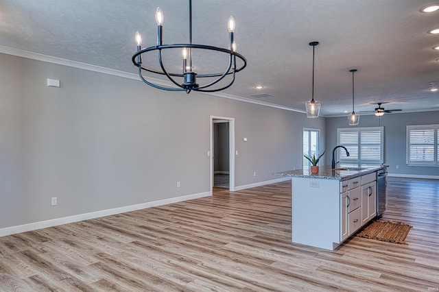 19138 Braeburn Dr, Evansville, IN 47725 - kitchen with open floor plan, ceiling fan with notable chandelier, light wood-style floors, a textured ceiling, and a sink