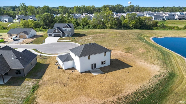 aerial view with a residential view and a water view