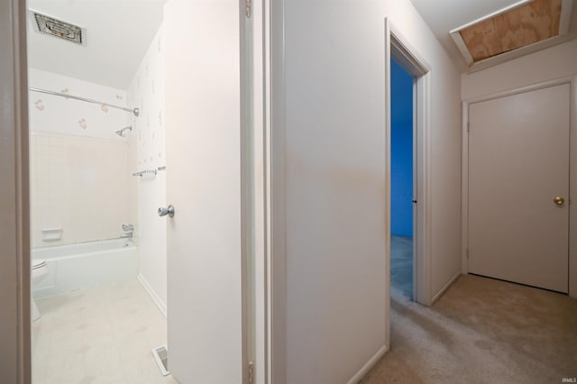 corridor with light carpet