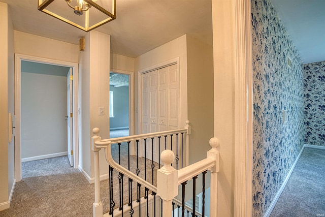 9700 Big Cynthiana Rd, Evansville, IN 47720 - corridor featuring an upstairs landing, baseboards, and carpet