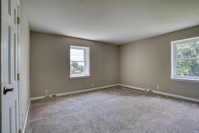 9700 Big Cynthiana Rd, Evansville, IN 47720 - unfurnished room featuring visible vents, baseboards, and carpet