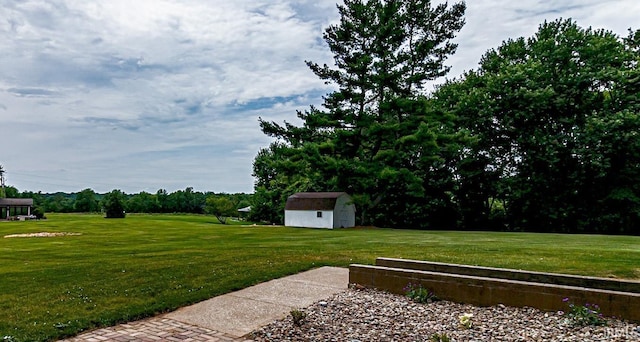 9700 Big Cynthiana Rd, Evansville, IN 47720 - view of yard with a storage shed and an outdoor structure