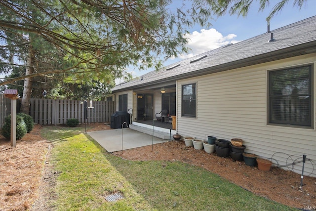 view of yard with a patio area and fence