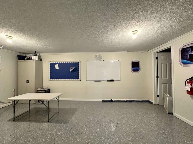 316 N Main St, Churubusco, IN 46723 - interior space with a textured ceiling, speckled floor, baseboards, and ornamental molding