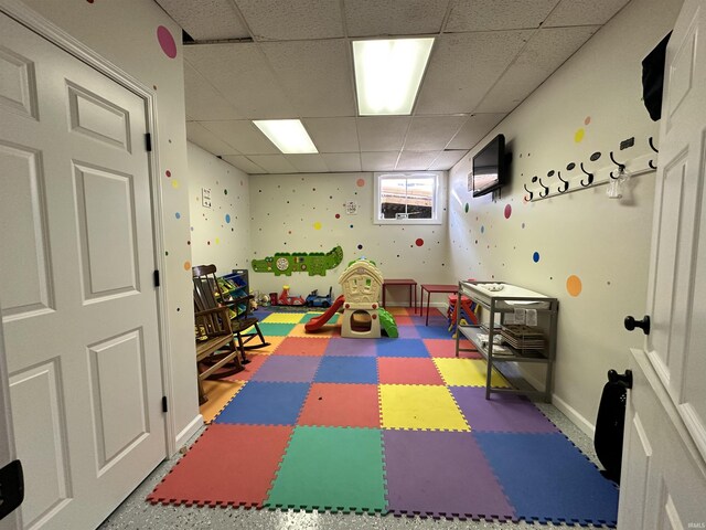 316 N Main St, Churubusco, IN 46723 - recreation room featuring a paneled ceiling and baseboards