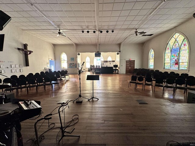 316 N Main St, Churubusco, IN 46723 - misc room with rail lighting and wood finished floors