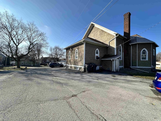 316 N Main St, Churubusco, IN 46723 - exterior space with a chimney