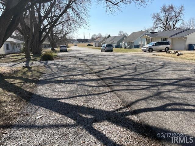 view of street featuring a residential view