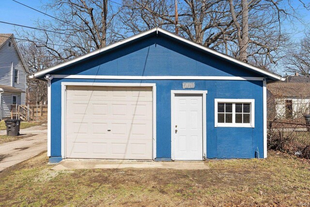 detached garage with fence