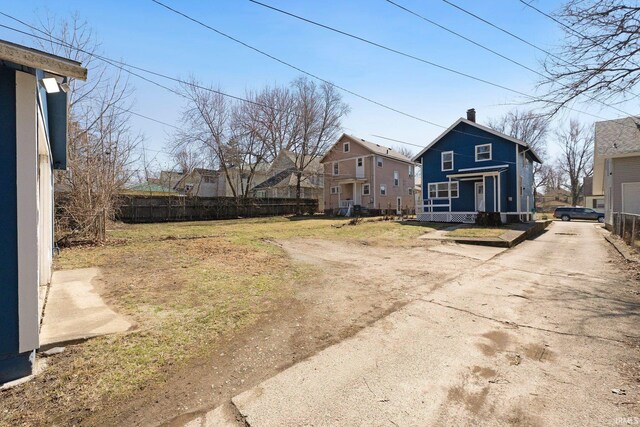 view of yard featuring fence