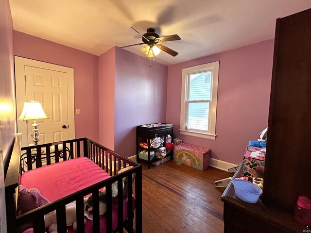 1428 11th St, Tell City, IN 47586 - bedroom featuring ceiling fan, baseboards, and wood-type flooring