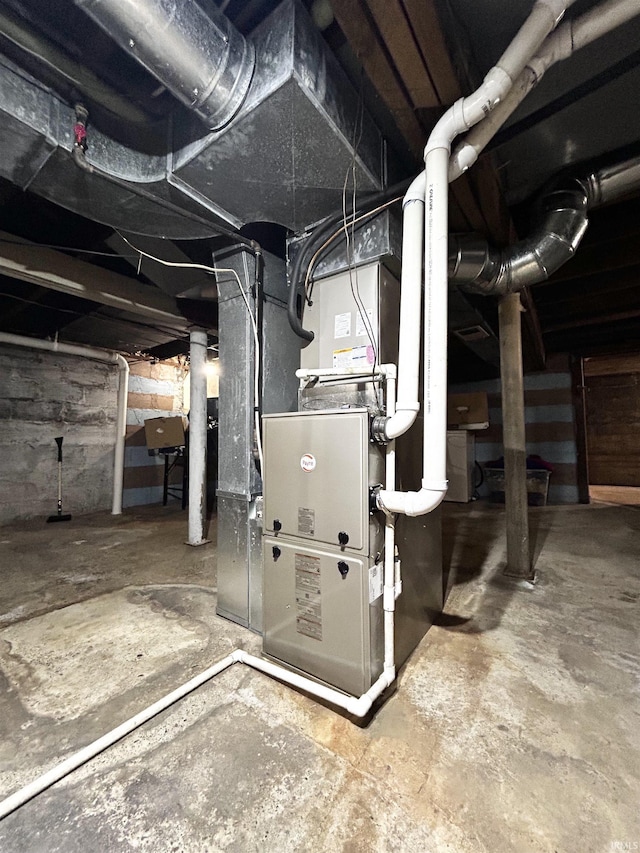 1428 11th St, Tell City, IN 47586 - utility room featuring heating unit