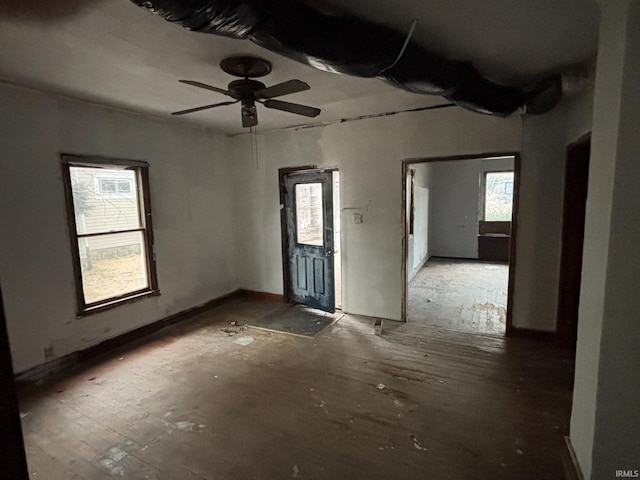 interior space featuring ceiling fan