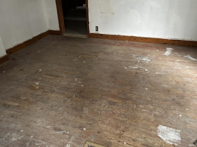 empty room featuring hardwood / wood-style flooring