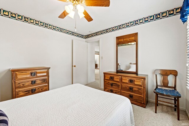 760 Ln 136 Turkey Lk, Hudson, IN 46747 - bedroom featuring baseboards, a ceiling fan, and carpet floors