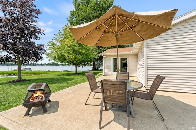 760 Ln 136 Turkey Lk, Hudson, IN 46747 - view of patio / terrace featuring outdoor dining space, a fire pit, and a water view