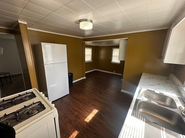 1130 N Lindsay St, Kokomo, IN 46902 - kitchen featuring dark wood-style floors, white appliances, and baseboards