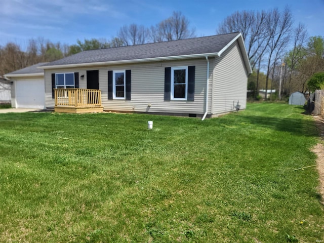 ranch-style home with a wooden deck and a front lawn
