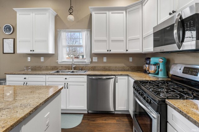 1814 Abbotsbury Way, Lafayette, IN 47909 - kitchen featuring white cabinetry, appliances with stainless steel finishes, and a sink