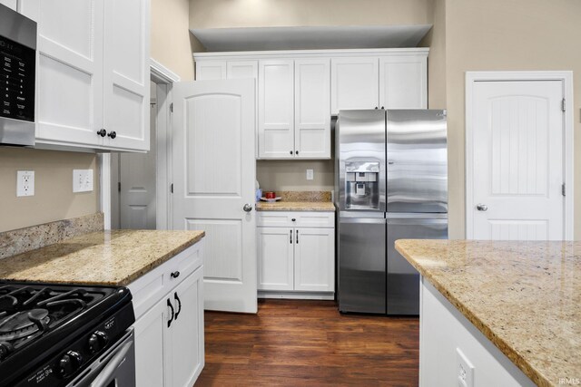 1814 Abbotsbury Way, Lafayette, IN 47909 - kitchen with white cabinets, dark wood-style flooring, and appliances with stainless steel finishes