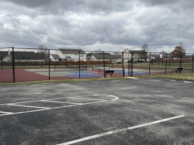 1814 Abbotsbury Way, Lafayette, IN 47909 - view of parking / parking lot with a tennis court and fence