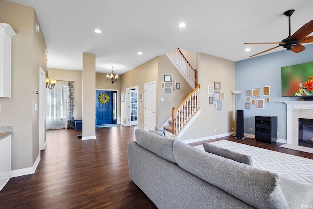1814 Abbotsbury Way, Lafayette, IN 47909 - living room with stairway, dark wood finished floors, recessed lighting, a tile fireplace, and ceiling fan with notable chandelier